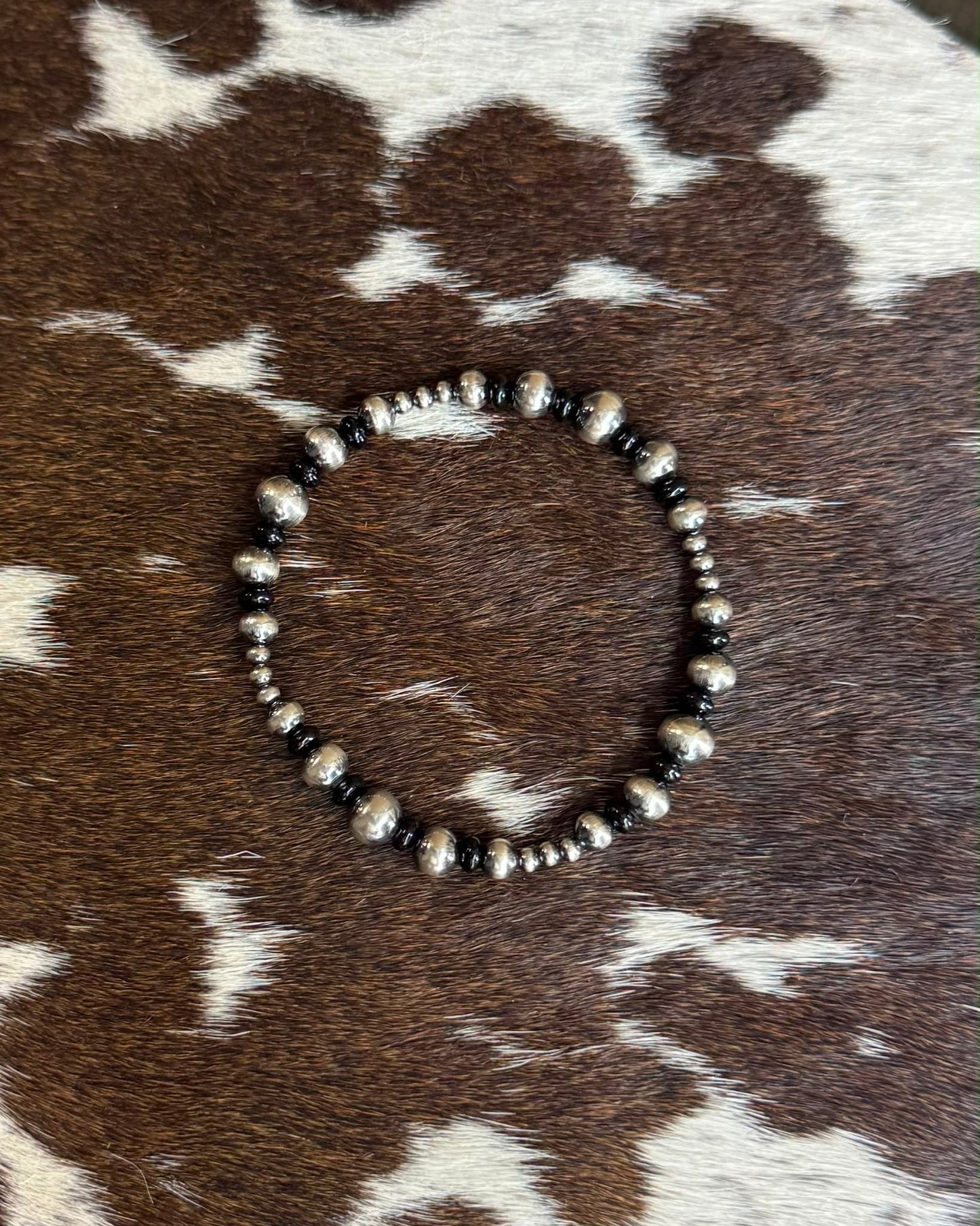 Black Onyx Graduated Stretch Bracelet *Non Native